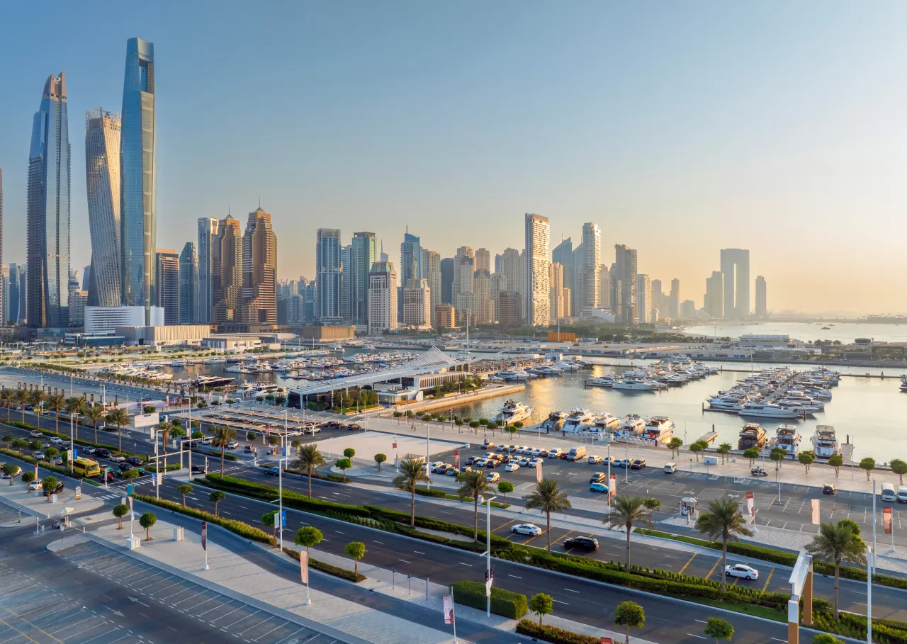 Yachts berthed at Dubai Harbour with the skyline beyond